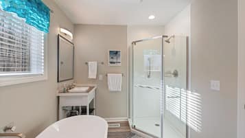 Shower, hair dryer, towels, soap