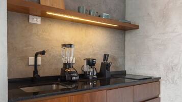 Fridge, microwave, stovetop, coffee/tea maker