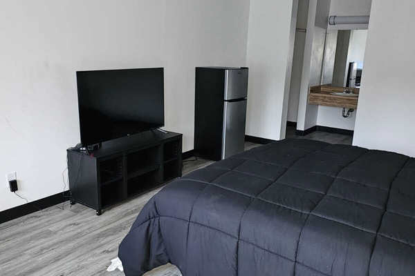 Deluxe Studio Suite | Laptop workspace, free WiFi