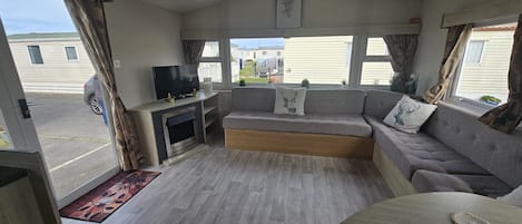 Cabin | Living area | TV, fireplace