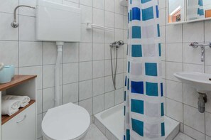 Secador de pelo y toallas