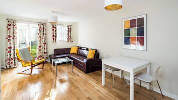 Classic Apartment | Living area | 1-inch TV with digital channels