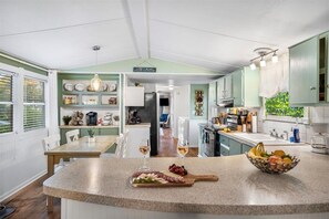 Fridge, microwave, oven, stovetop - Hot Tub, Fire pit, Cabana, Covered Patio & Pet-friendly Riverside Retreat (New Braunfels)
