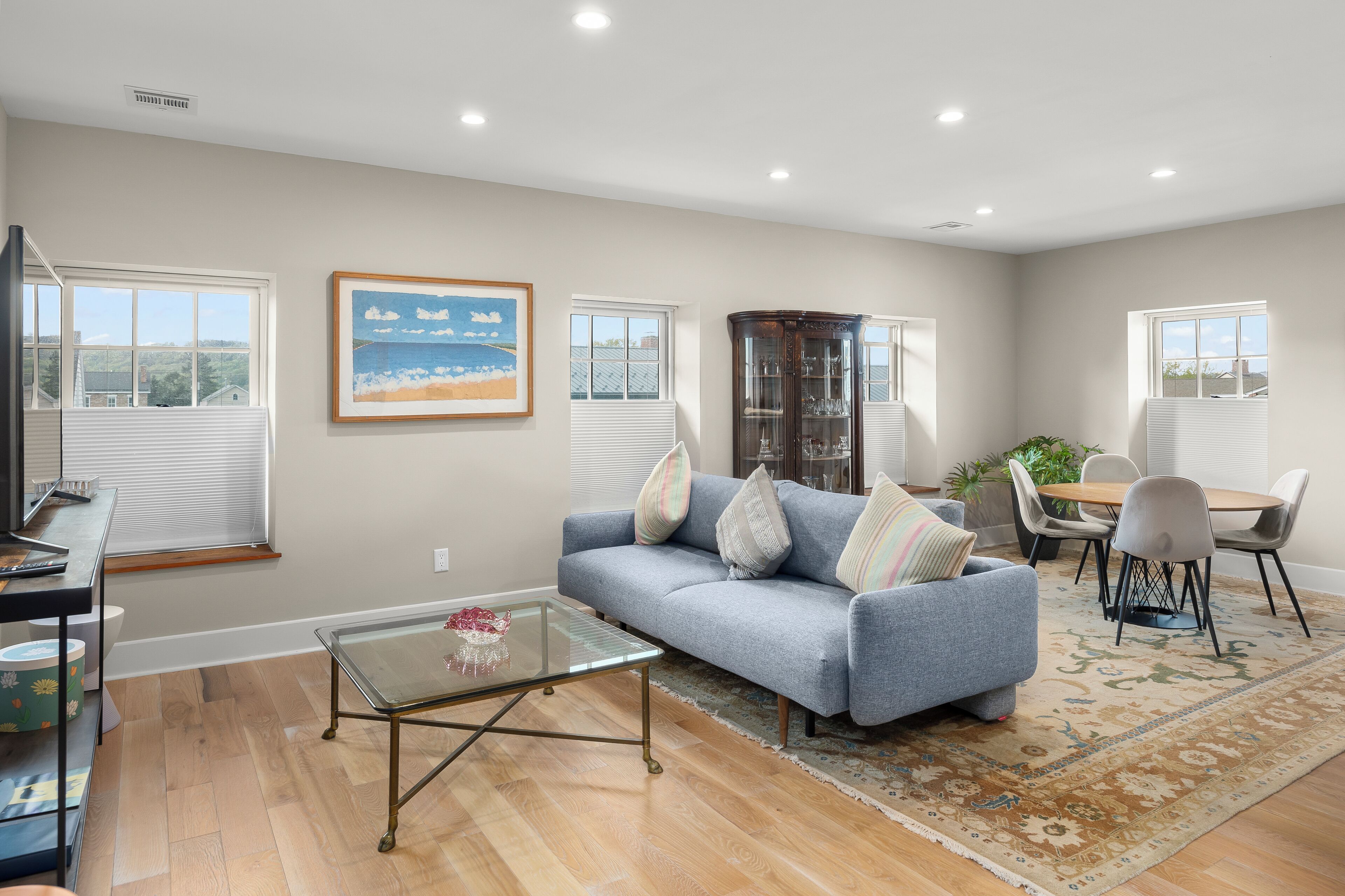 Signature Apartment | Living area | 47-inch flat-screen TV with digital channels, printers