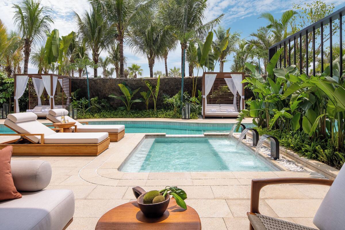 Suite, 1 Bedroom, Pool Access | Minibar (free items), in-room safe, desk, blackout drapes