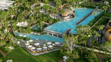 3 outdoor pools, open 8:00 AM to 11:00 PM, free cabanas, pool umbrellas