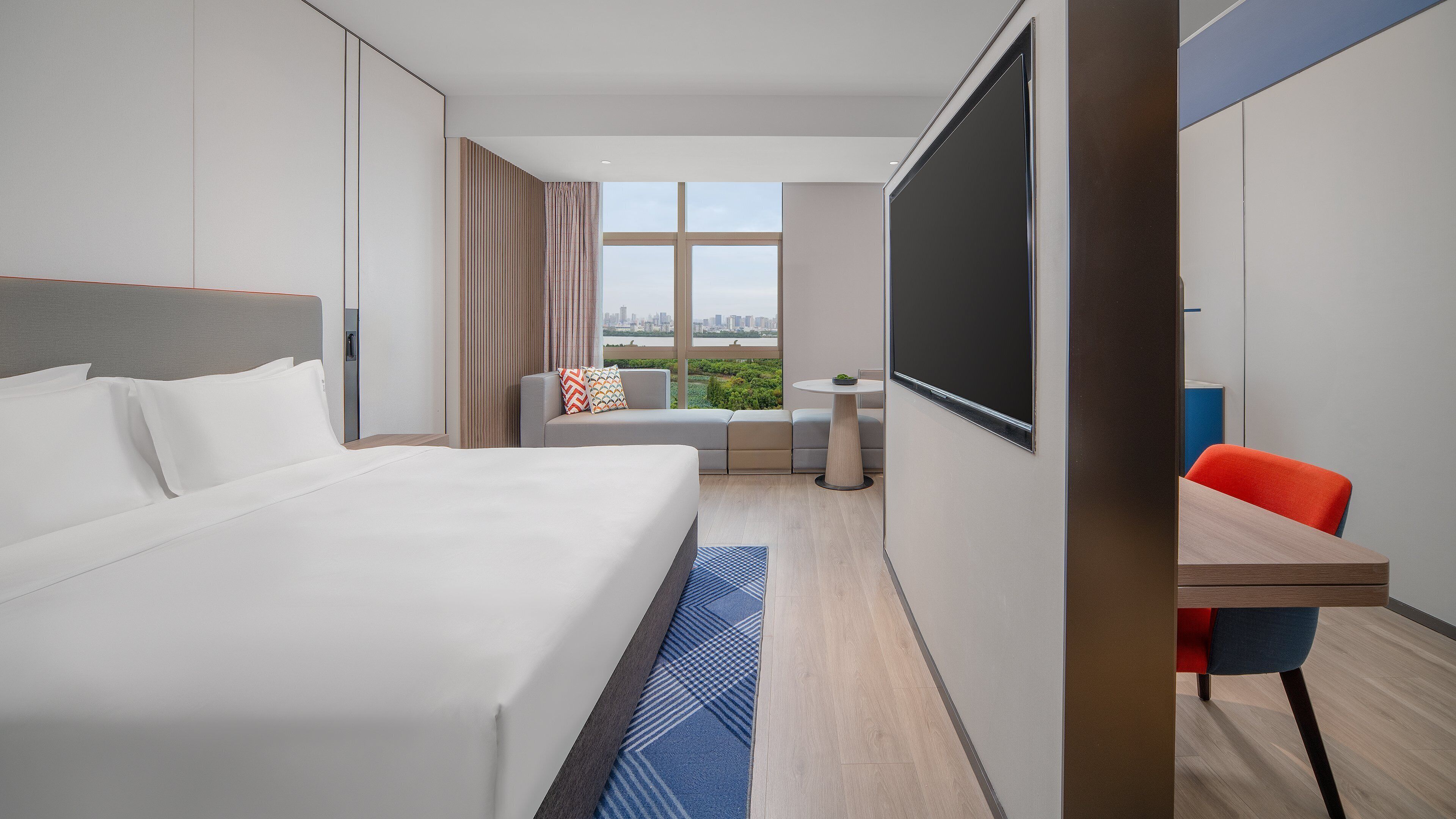 Premium bedding, down comforters, desk, laptop workspace