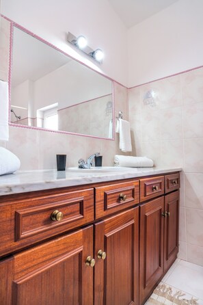 Hair dryer, bidet, towels, soap