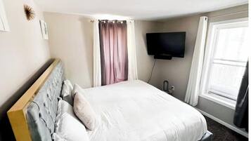 2 bedrooms, desk, iron/ironing board, travel crib