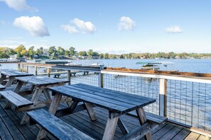Outdoor dining - Golf, Fish, Boat, Relax, Repeat! 4-bed, 2-bath house steps away from the lake. (Watervliet)