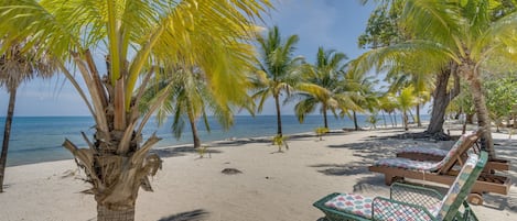 On the beach, sun loungers