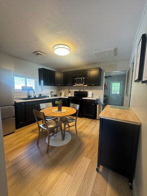 Private kitchen - Charming 3 BR Cottage Walk to AOTG and minutes to NRG National Park (Lansing)