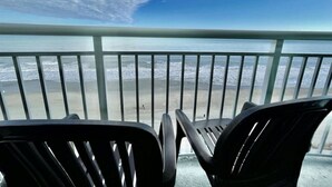 A balcony with a view of the beach and ocean. - Right next to family Kingdom! Oceanfront 1br full kitchen washer/dryer 1107 (Myrtle Beach)