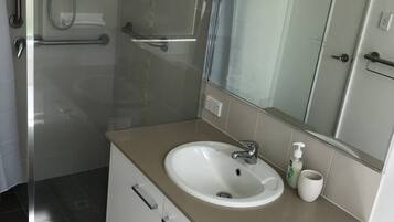 Shower, hair dryer, towels