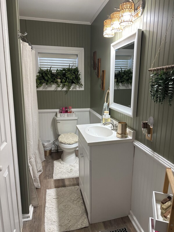 Hair dryer, towels, soap, shampoo