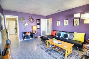 TV, offices - Retro-Inspired Stay, BBQ Patio, Close to Downtown (Sarasota)