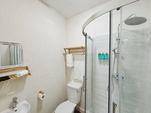 Shower, hair dryer, towels, soap