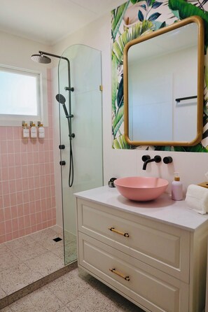 Shower, hair dryer, towels, soap