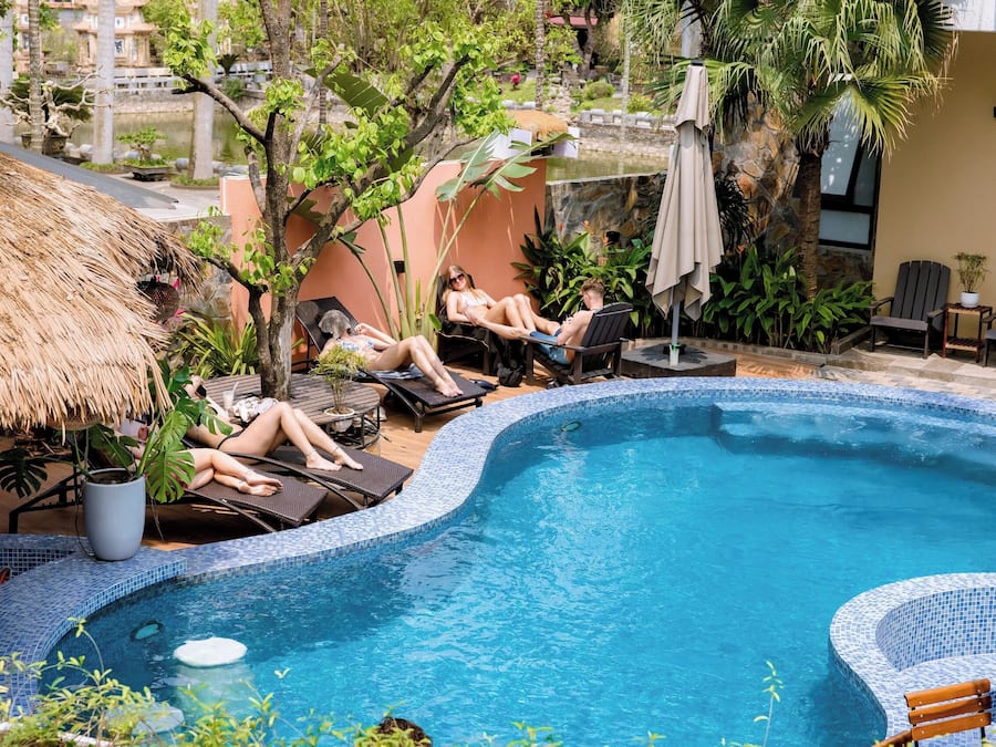 Outdoor pool, pool umbrellas, sun loungers