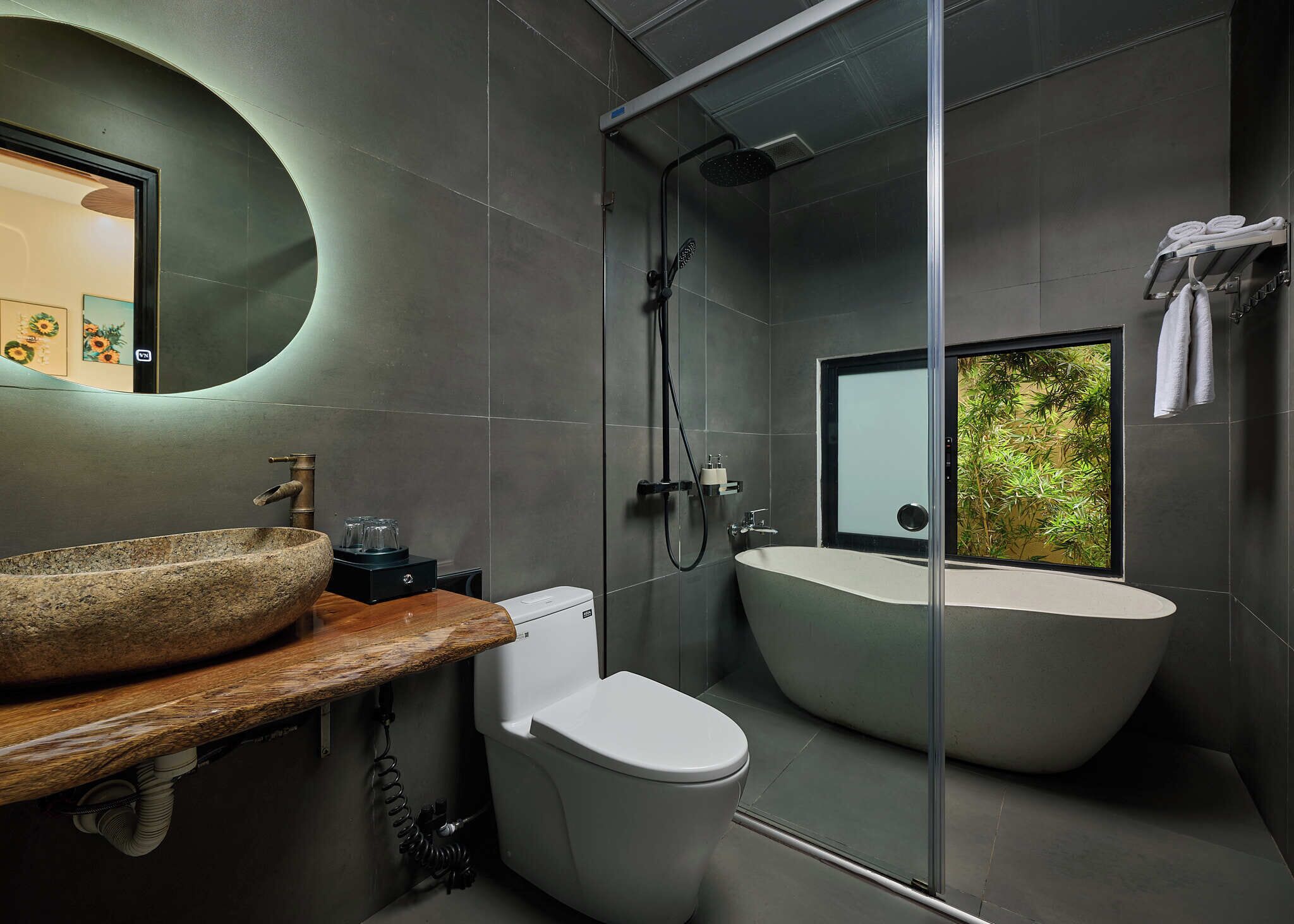 Deluxe Double Room, Bathtub, Pool View | Bathroom | Hair dryer, slippers, towels, soap