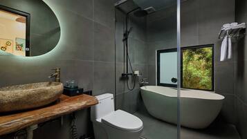 Deluxe Double Room, Bathtub, Pool View | Bathroom | Hair dryer, slippers, towels, soap