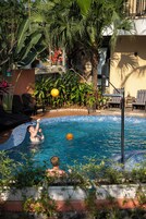 Outdoor pool, pool umbrellas, sun loungers