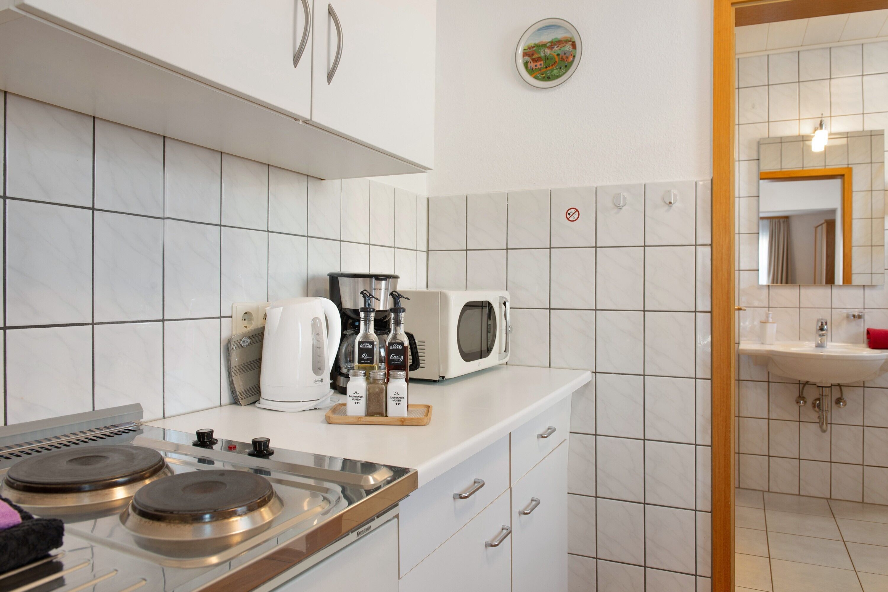Fridge, microwave, stovetop, coffee/tea maker
