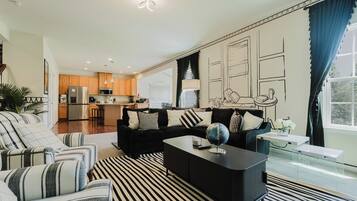 Smart TV, fireplace, foosball, books