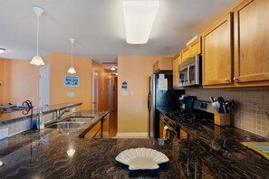 Fridge, oven, dishwasher, coffee/tea maker