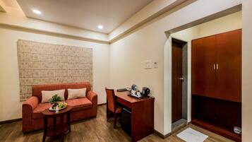 Suite With Balcony | In-room safe, desk, blackout drapes, iron/ironing board