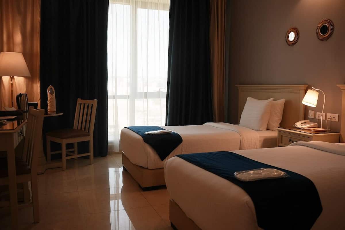 Premium bedding, desk, laptop workspace, soundproofing