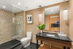 Shower, hair dryer, towels, soap