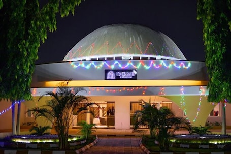 Front of property - evening/night. Dome Suites by Makblo