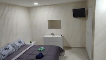 1 habitación y ropa de cama