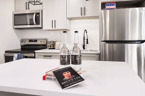 Fridge, microwave, oven, stovetop - Bruce Lee 1BR Condo, Brand New in Queen Anne (Seattle)