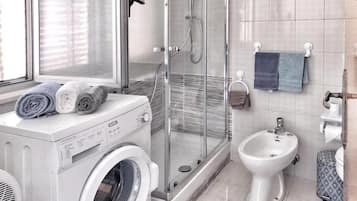 Hair dryer, towels, soap, toilet paper