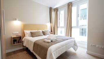 Premium bedding, down comforters, in-room safe, blackout drapes