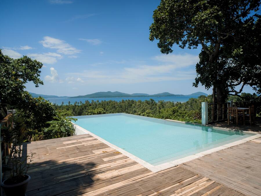 Outdoor pool, open 7:30 AM to 7:00 PM, pool loungers