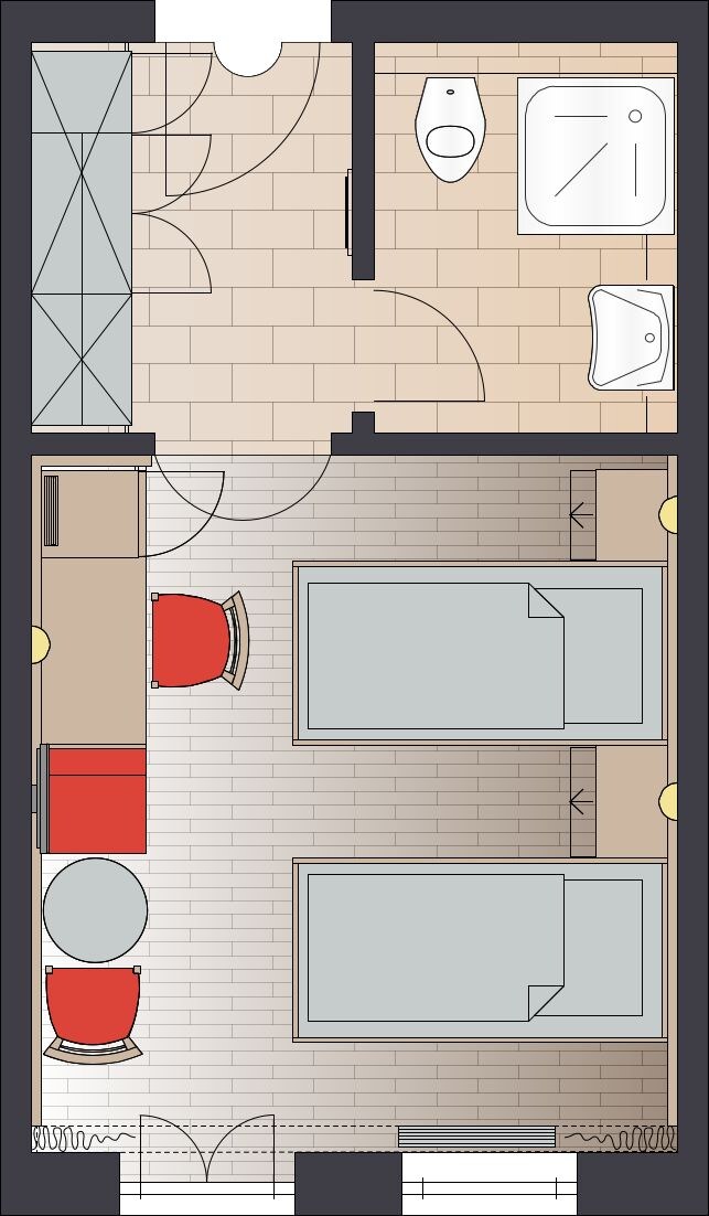 A hotel room layout with two beds, a bathroom, and a seating area.