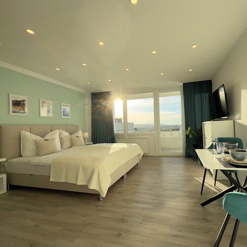 M&D Apartments nähe Stadion mit Balkon - Netflix - Küche - Sunset View