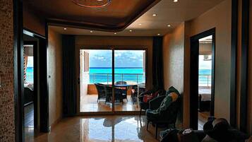 Luxury Apartment, 2 Bedrooms, Sea View | Living room | 43-inch flat-screen TV with satellite channels