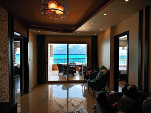 Luxury Apartment, 2 Bedrooms, Sea View | Living room | 43-inch flat-screen TV with satellite channels