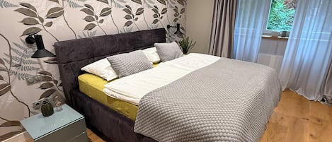 2 bedrooms, in-room safe, iron/ironing board, travel cot
