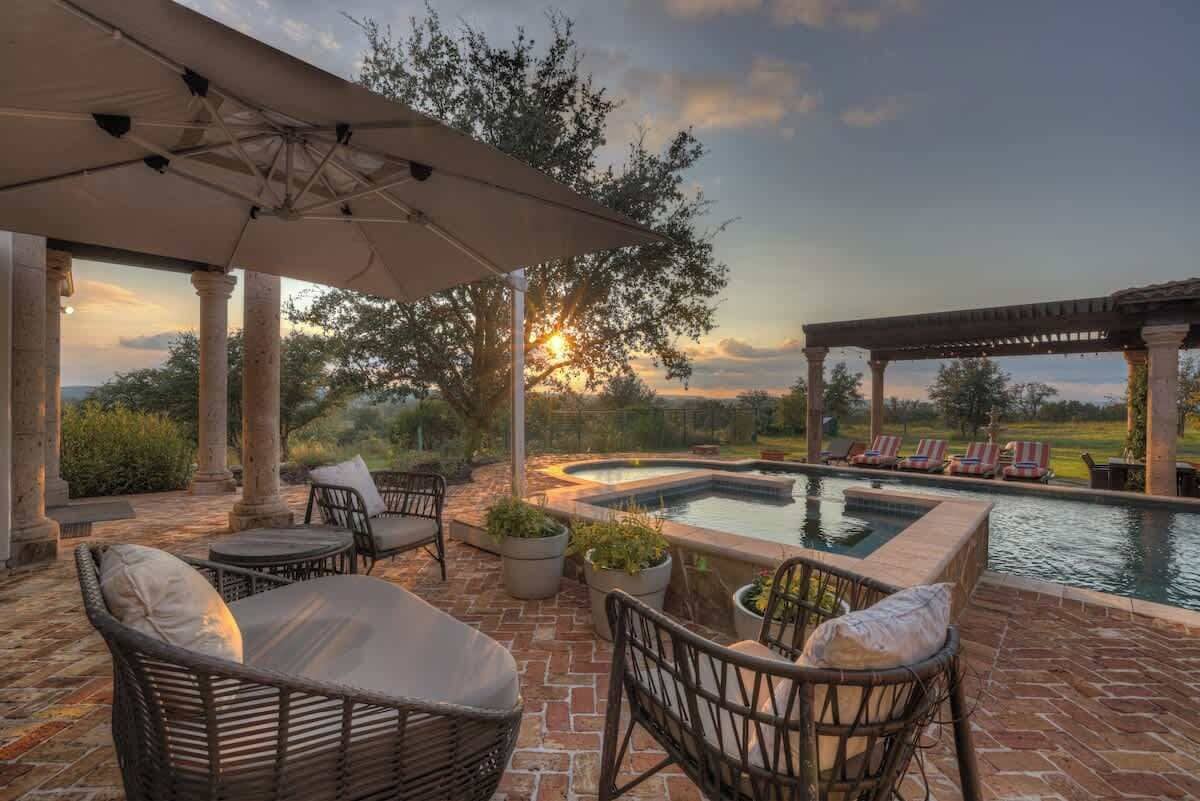 Outdoor pool, pool umbrellas, sun loungers