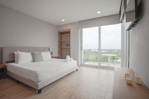 Departamento Deluxe, vista al campo de golf | Sábanas de algodón egipcio y ropa de cama de alta calidad