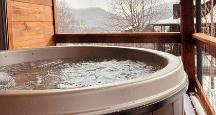 Relax & Recharge: Comfy Cabin with Hot Tub & Mountain Views