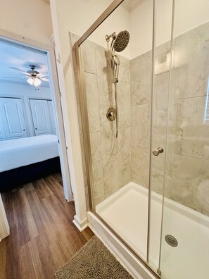 Shower, hair dryer, towels, soap