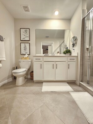 Shower, hair dryer, towels, soap