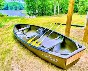 Canoe - Room for three and a quiet paddle into the no-wake cove, a slow morning on glassy water before the lake wakes up.