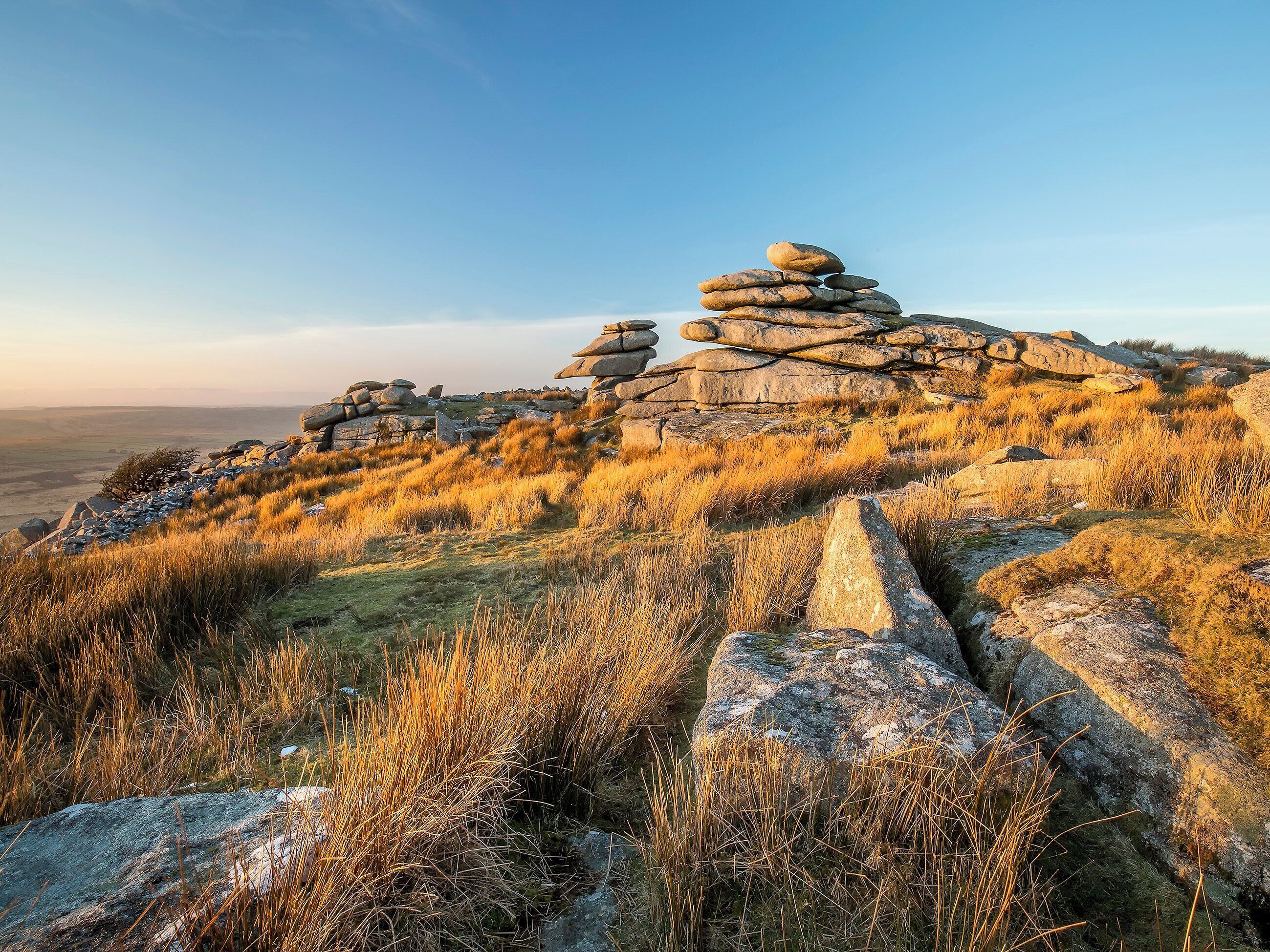 A rocky landscape with a clear sky.
